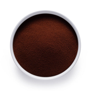 Dolce Superfoods instant chicory root powder in white bowl on white background