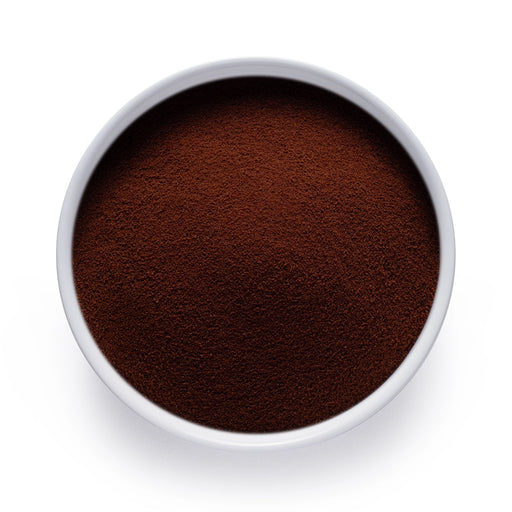 Dolce Superfoods instant chicory root powder in white bowl on white background