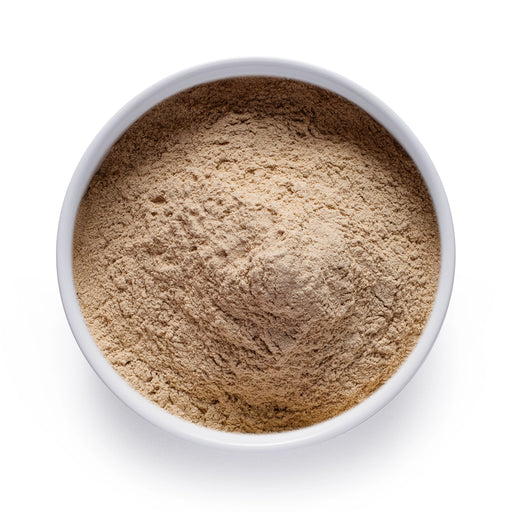 Dolce Superfoods organic ashwagandha root powder in white bowl on white background