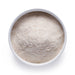 Dolce Superfoods coconut water powder in white bowl on white background