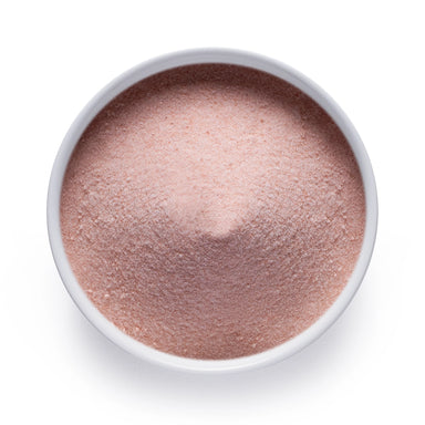 Dolce Superfoods Himalayan pink salt in white bowl on white background
