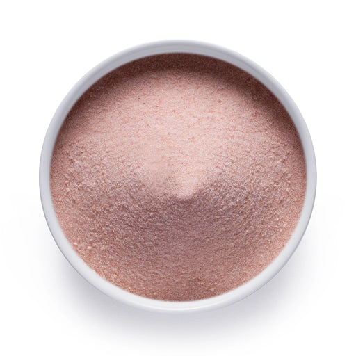 Dolce Superfoods Himalayan pink salt in white bowl on white background