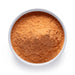 Dolce Superfoods organic goji berry powder in white bowl on white background