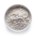 Dolce Superfoods organic MCT oil powder in white bowl on white background