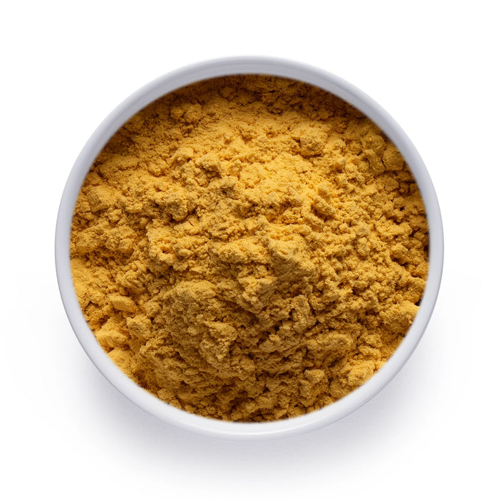 Dolce Superfoods organic sea buckthorn powder in white bowl on white background