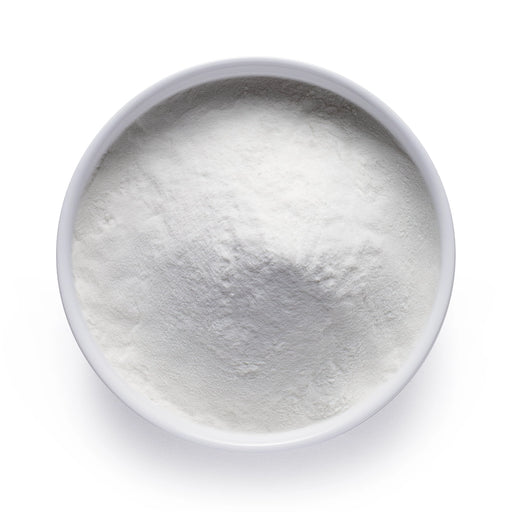 Dolce Superfoods marine magnesium powder in white bowl on white background