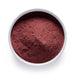 Dolce Superfoods organic beetroot powder in white bowl on white background