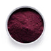 Dolce Superfoods organic blueberry powder in white bowl on white background