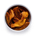 Dolce Superfoods organic dried mango cheeks in white bowl on white background