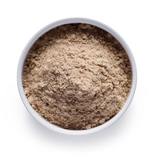 Dolce Superfoods organic tigernut flour in white bowl on white background