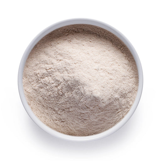 Dolce Superfoods psyllium husk powder in white bowl on white background