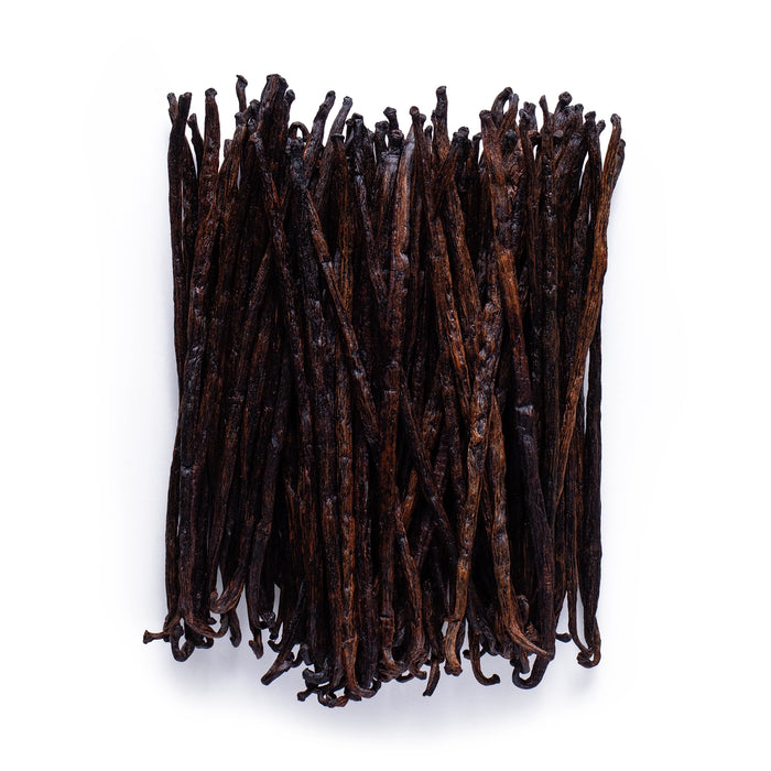 Dolce Superfoods Grade B vanilla beans on white background