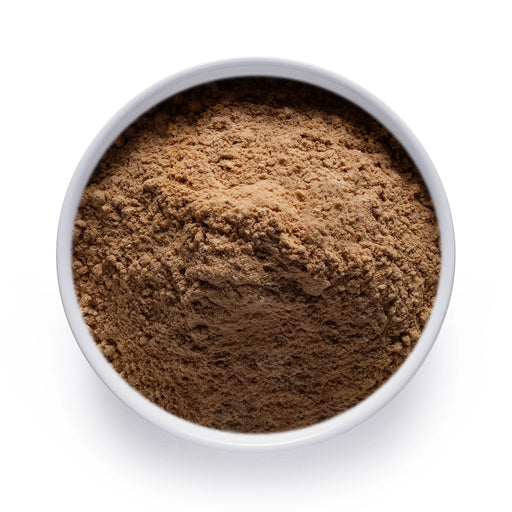 Dolce Superfoods maitake mushroom powder in white bowl on white background