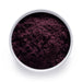 Dolce Superfoods organic maqui powder in white bowl on white background