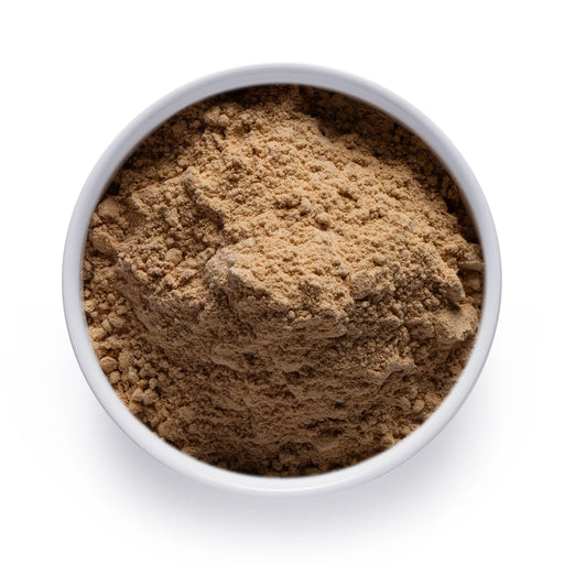 Dolce Superfoods shiitake mushroom powder in white bowl on white background