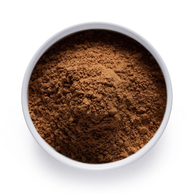 Dolce Superfoods dried turkey tail mushrooms in white bowl on white background