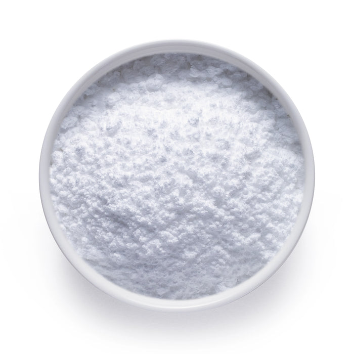 Bulk organic creatine monohydrate powder in a white bowl, fine white micronized powder for wholesale supply