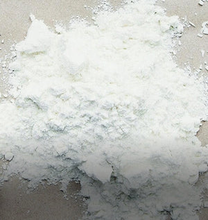 Organic coconut milk powder pile – Dolce Superfoods bulk wholesale ingredient