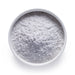 Bulk melatonin powder in a white ceramic bowl, wholesale superfood ingredient by Dolce Superfoods