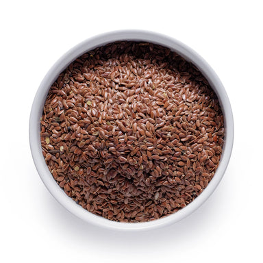 Bulk organic brown flax seeds in a white ceramic bowl, wholesale superfood ingredient by Dolce Superfoods
