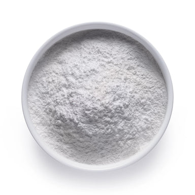 Bulk organic cashew milk powder in a white ceramic bowl, wholesale superfood ingredient by Dolce Superfoods
