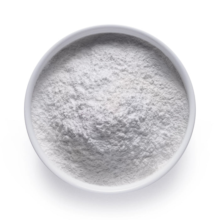 Bulk organic cashew milk powder in a white ceramic bowl, wholesale superfood ingredient by Dolce Superfoods