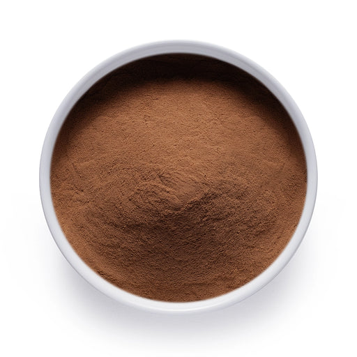 Bulk organic guarana powder in a white ceramic bowl, wholesale superfood ingredient by Dolce Superfoods
