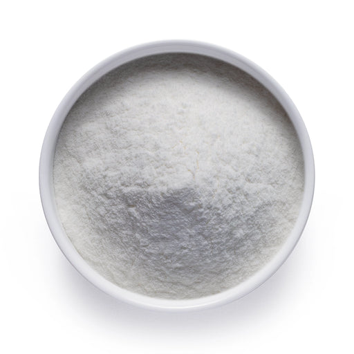 Bulk organic lemon powder in a white ceramic bowl, wholesale superfood ingredient by Dolce Superfoods