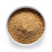Bulk organic ground golden flax seeds in a white ceramic bowl, wholesale superfood ingredient by Dolce Superfoods