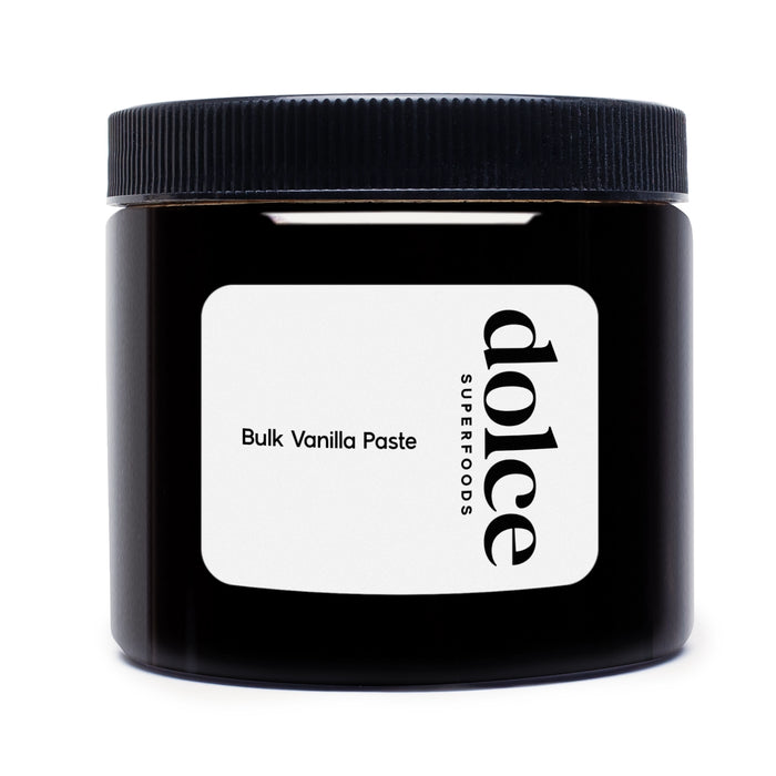 Black jar of bulk vanilla paste with Dolce Superfoods label